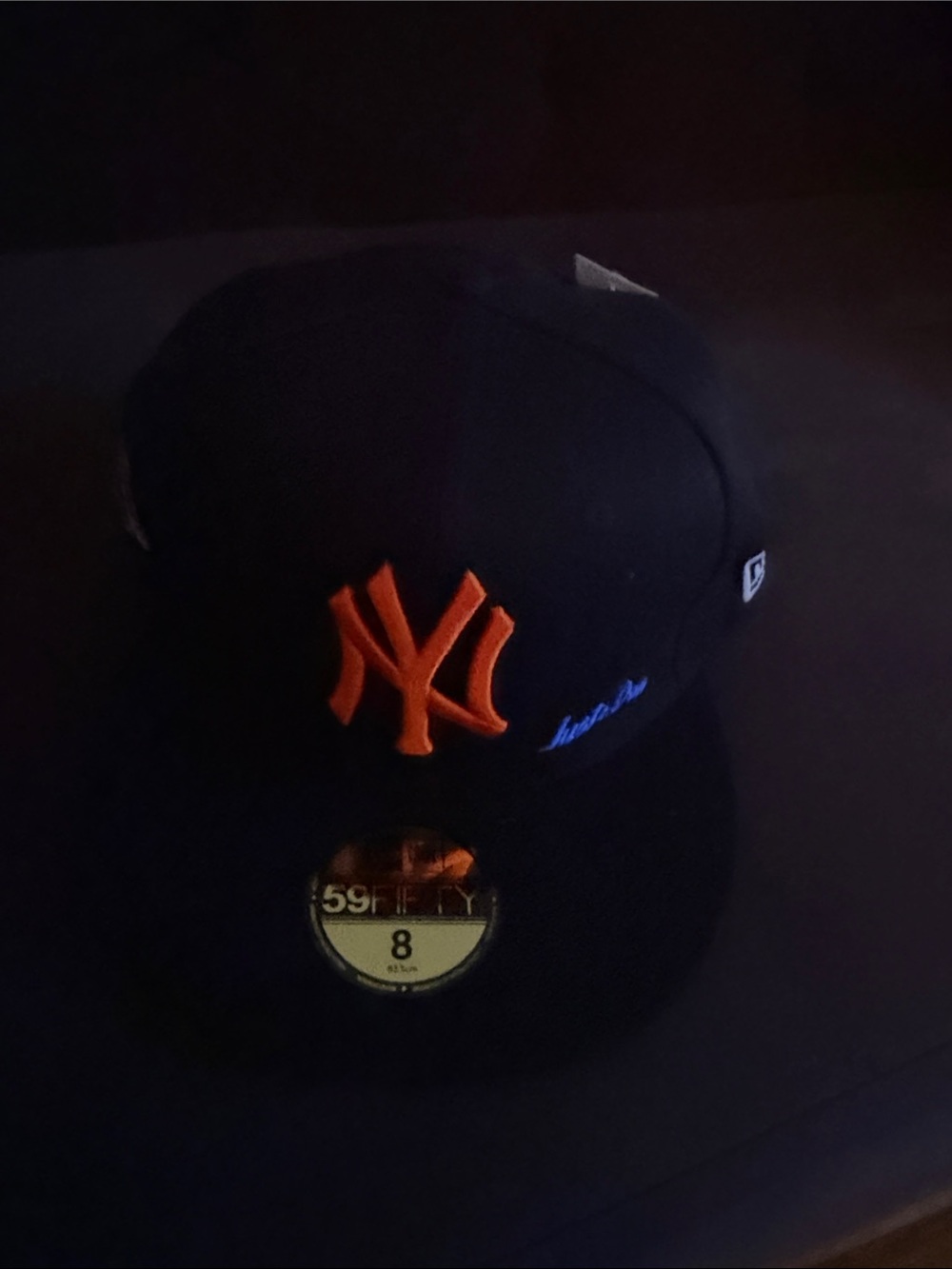 New Era Kids Black Cap with Orange NY Logo and Blue Script